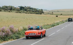 Oklahoma has plenty of open road to enjoy at a safe social distance. Here, a couple is shown taking a road trip in Oklahoma.