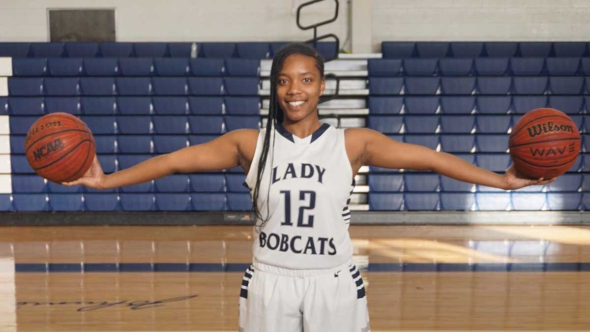 Travisha Cogdell shows off her wingspan in the Break it Down series.