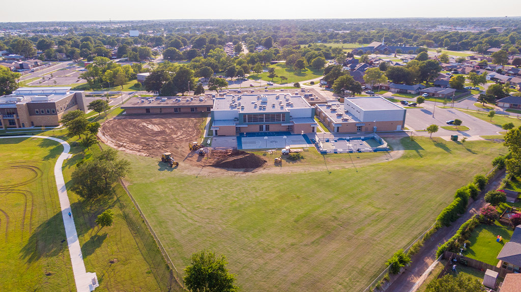 OKCPS Southeast Middle School during early field construction by Fields & Futures