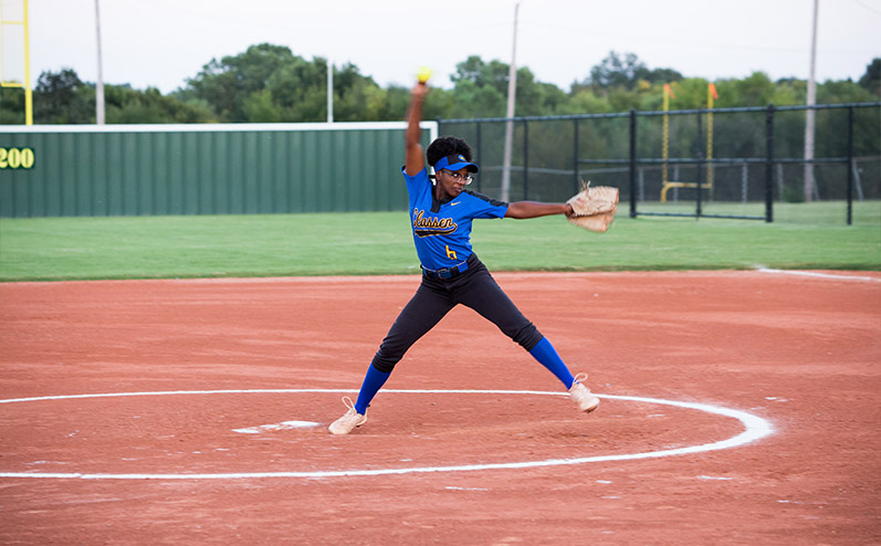 Classen SAS High School softball player Symone Talley pitching on a softball field built by Fields & Futures for Oklahoma City Public Schools